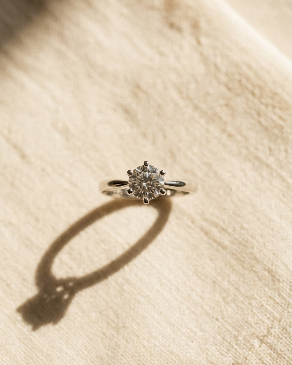 overhead jewelry photographed with bling ai — natural shadow, mid-morning